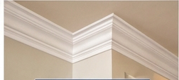 Crown molding installation example — white crown molding detail