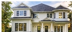 Exterior painting example — freshly painted two-story home